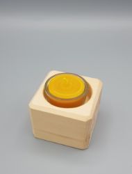 Bild von Zirbenholzwürfel mit 2 Ziernuten inkl. Teelicht aus Bienenwachs